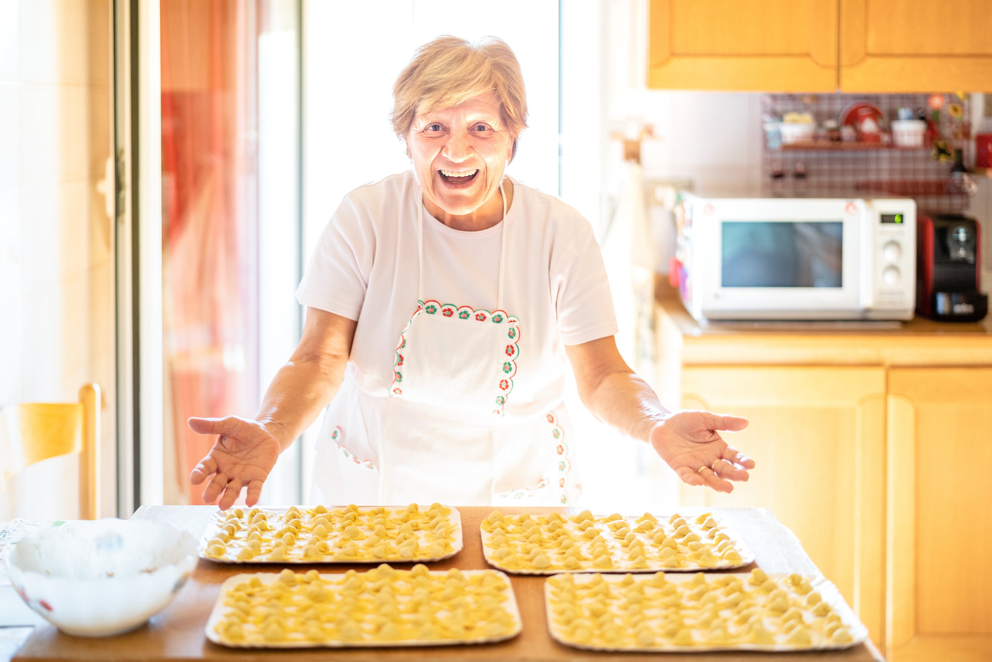 Elderly Woman Presenting Her Homemade Cappelletti 